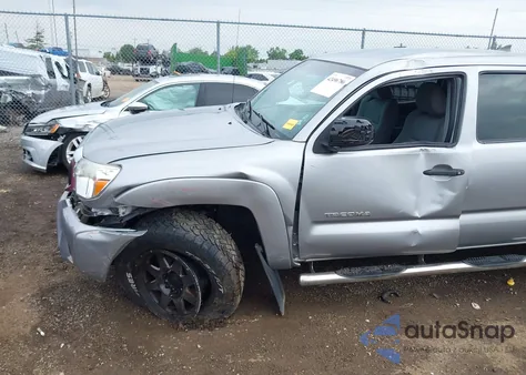 2014 Toyota Tacoma Base V6 z USA, uszkodzony, nr VIN 3TMLU4EN9EM156197